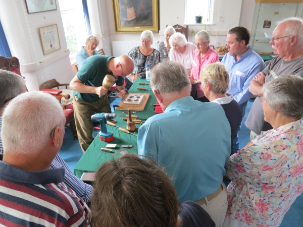 Master wood carver  Laurence Beckford demonstrates his skills
